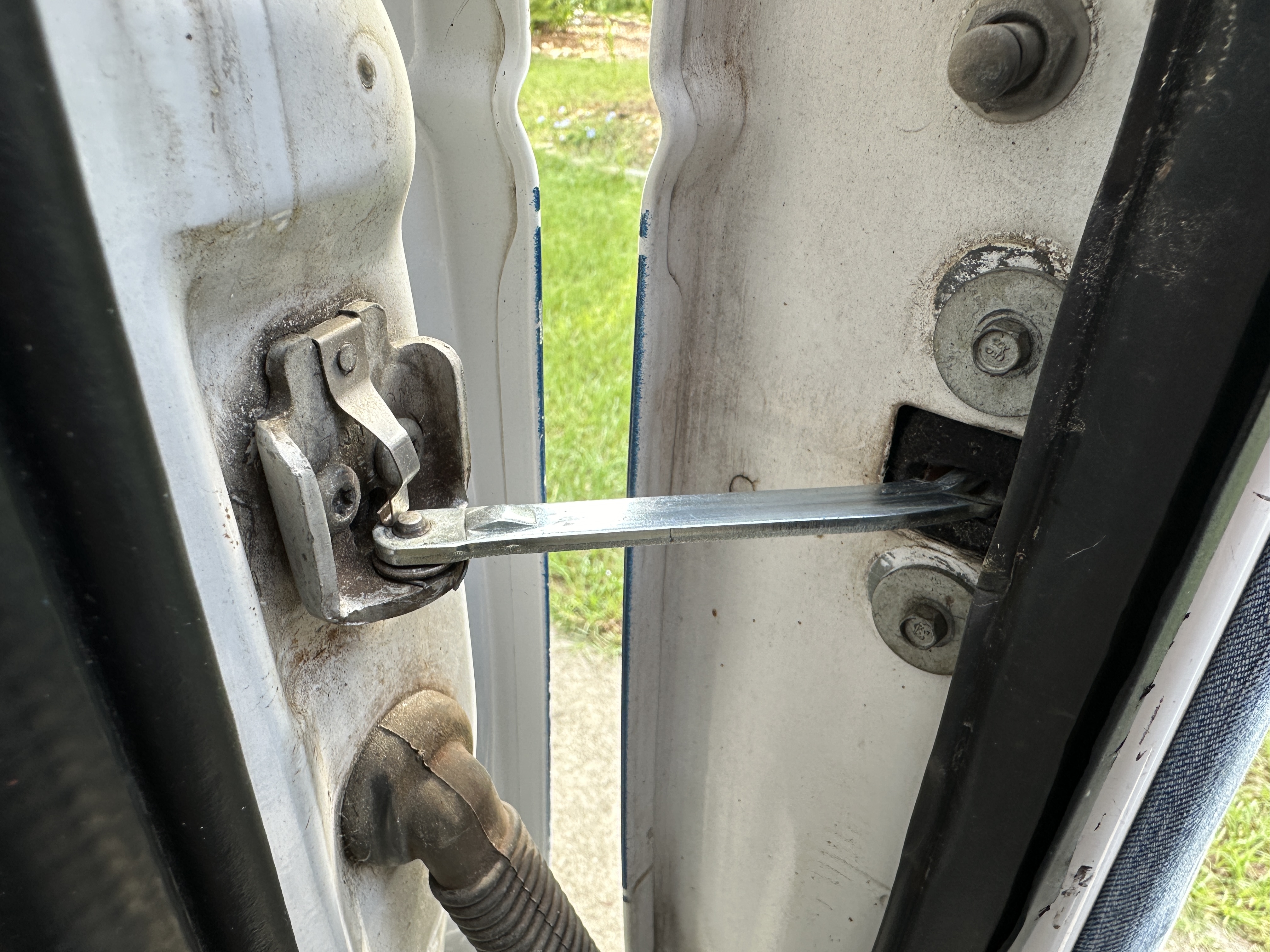 How to Install a Door Check on a Ford E250 Van