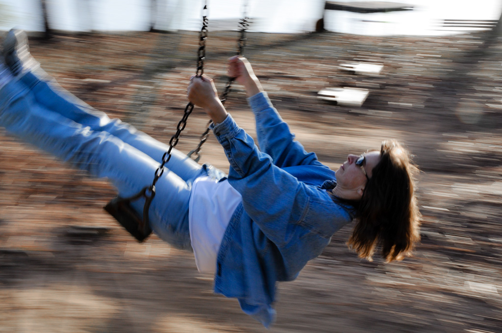 Deborah Swinging at the Park